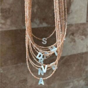 Elegant Beaded Necklace with Alphabet Letter “O” Charms